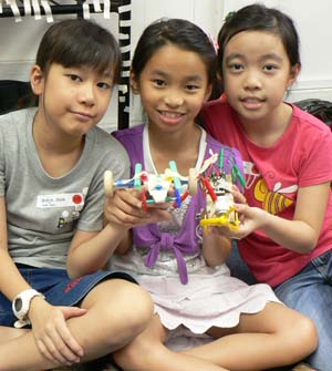 Kids building a creative learning activity
